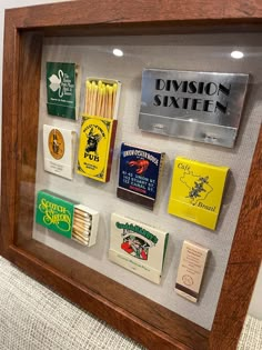 a display case with matches and matchboxes in it