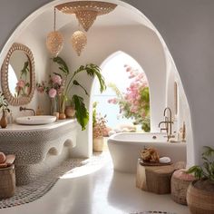 a bathroom with an arched doorway leading to the outside, and flowers on the walls