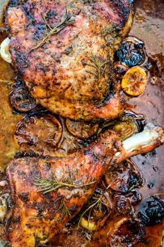 a roasting pan filled with chicken and vegetables