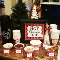 there is a hot chocolate bar set up on the table