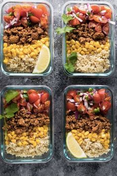 four glass containers filled with different types of food and garnished with cilantro