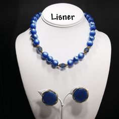 *Description: This is a great Moonglow set by Lisner from the 1950s. The medium blue moonglow Lucite beads also have Lucite clear blue faceted beads with filigree bead caps as in three sections. There are twenty-two Lucite Moonglow beads and three inches of extension chain. The Lisner tag is on one end with the hook clasp with the name Lisner on the back at the other end. The matching blue Moonglow clip on earrings are a little over an inch with the Moonglow cabochon framed in a gold tone frame. Vintage Czech Glass Jewelry For Party, Retro Blue Jewelry For Party, Vintage Blue Jewelry For Evening, Blue Vintage Jewelry For Evening, Blue Beaded Evening Jewelry, Blue Beaded Jewelry For Evening, Retro Beaded Evening Jewelry, Retro Beaded Jewelry For Evening, Vintage Blue Jewelry For Party