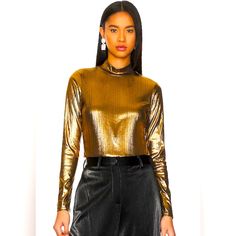 95% Polyester, 5% Spandex Machine Wash Mockneck Styling Gold-Tone Metallic Finish Fall Party Crop Top With Crew Neck, Fall Crew Neck Crop Top For Party, Fall Crew Neck Crop Top For Night Out, Chic Party Crop Top With Crew Neck, Chic Crew Neck Crop Top For Party, Trendy Metallic Tops For Fall, Metallic Fitted Tops For Spring, Chic Fitted Metallic Crop Top, Chic Metallic Crop Top For Spring