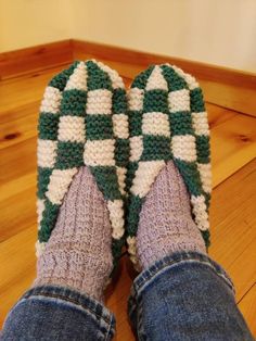 A rich forest green and natural white combination that are warm and cozy. Checkerboard slippers the way Grandma made them with a twist. Worked in wool blended with nylon, these slippers are wonderfully warm and long lasting! Two colours of wool are knit together to create a warm slipper with tons of cushioning.  Each pair is made to order, please see shipping times to estimate arrival. Message me for availability of other colours or any questionsy Comfortable Green Indoor Slippers, Green Comfortable Slippers With Round Toe, Green Slip-on Winter Slippers, Comfortable Green Slippers For Winter, Comfortable Green Winter Slippers, Green Casual Slippers For Winter, Green Casual Indoor Slippers, Knit Slippers, Wool Slippers