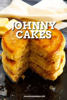 a close up of a cake on a plate with the words johnny cakes in front of it