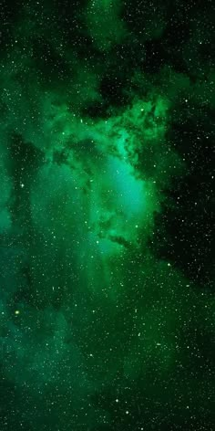 the night sky is filled with stars and green lights