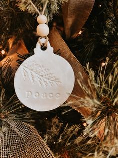 White Clay Textured Peace Ornament with Wooden Beads | Clay Gift Tag Fragile Set of 5 available in Etsy shop Clay Christmas Tags, Textured Ornaments, Baby Gift Tags, Clay Gift Tags, Dove Ornaments, Wedding Doves, Beads Clay, Clay Christmas, Christmas Clay