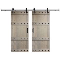 two wooden doors with black hardware on the top and bottom, both open to reveal an industrial design