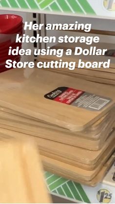 a pile of wooden cutting boards sitting on top of each other in front of a store counter