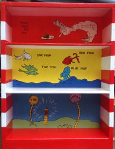 the dr seuss bookshelf is painted red, white and blue