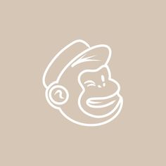 an image of a monkey with headphones on it's ears and wearing a hat