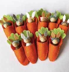 several carrots with little people in them