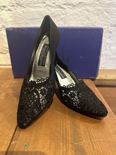 Gorgeous Vintage Special Occassion Ladies Shoes, by Stuart Weitzman  from Russell & Bromley circa 1990's. Black Fabric, main area and heal satin and front area toe lace, leather lining and sole. Size UK 5.5. Heal height approx 2.5/3". Beautiful shoes never worn, the price is still on the bottom,  original box and receipt. Perfect for that special occassion, elegant and sophisticated will really enhance any outfit. Black Brogue Detailed Slip-ons For Formal Occasions, Luxury Lace-up Shoes With Perforated Toe Box, Black Low-top Lace-up Shoes With Perforated Toe Box, Elegant Black Lace-up Shoes With Perforated Toe Box, Elegant Pointed Toe Lace-up Shoes With Perforated Toe Box, Lace Mesh Dress, Black Fabric, Womens Heels, Stuart Weitzman