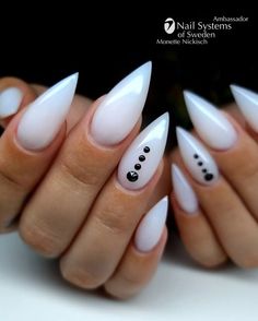 White Nail Black Design, White Nails Stiletto Long, Black N White Nails Designs, White Stilletos Nails, White Goth Nails, Milky White Stiletto Nails, Sparkle Stiletto Nails, White Pointy Nails, Black And White Stiletto Nails