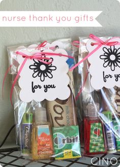 two bags filled with personalized items on top of a shelf