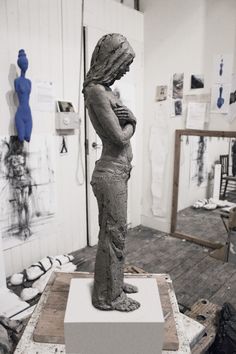 a sculpture is shown in an art studio