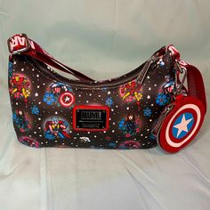 Avengers Assemble! This Super Cool Colorful All Over Tattoo Print With Your Favorite Avengers Represented. Comes With A Captain America Shield Coin Purse. New With Tags. Open To Reasonable Offers. Check Out My Closet And Combine Items For Better Pricing & Combined Shipping. Avengers Tattoo, Tattoo Shoulder, Captain America Shield, Loungefly Bag, Marvel X, Avengers Assemble, Shoulder Tattoo, Super Cool, Captain America