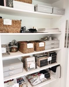 the shelves are filled with baskets and other items