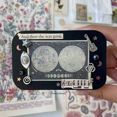 someone is holding up a magnet with two moon images on it and the caption says and then she was gone