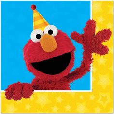 the sesame street character is wearing a party hat