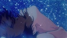 a person laying down on the ground with their head up in the air and stars behind them