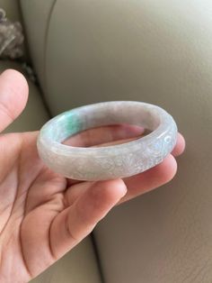 "🌈 Jade Bangle 54.0mm (2.13\"), Round Shape, Light Green 🌷 Untreated Natural Jadeite/ Grade A Jade 🌷 Certified : Yes 🌷 Jade from Burma/ Myanmar 🌷 Shape : Round 🌷 Inner diameter : 54.0mm / 2.13\" 🌷 Width & Thickness : 14.2 x 7.8 mm 🌷 Color : Light Green 🌷 Free standard shipping from Hong Kong with tracking included 🌷 Take approximately 7-21 days to arrive worldwide" White Engraved Round Bracelets, White Carved Bracelet Jewelry, Carved White Bracelet Jewelry, White Carved Bracelet, White Carved Bracelets, White Carved Round Bracelet, Spiritual Carved Round Bracelets, Spiritual Round Carved Bracelets, Carved Jade Round Bracelets