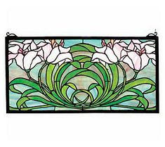 a stained glass window with pink flowers in the center and green leaves on the outside