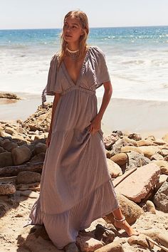 Forever free and flowy, this effortless maxi dress from our free-est collection is featured in a V-neck, tiered silhouette with flutter sleeves for added shape. * Soft, textured fabrication * Elastic empire waist * Effortless, pull-on style | La La Maxi Dress by free-est at Free People in Grey, Size: L Free People Maxi, Free People Maxi Dress, Short Sleeve Maxi Dresses, Wardrobe Inspiration, Satin Midi Dress, Senior Pics, Boho Maxi, Style Maxi Dress, Midi Maxi Dress