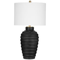 a black table lamp with a white shade