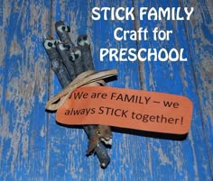 an orange sign that says we are family - we always stick together on some sticks