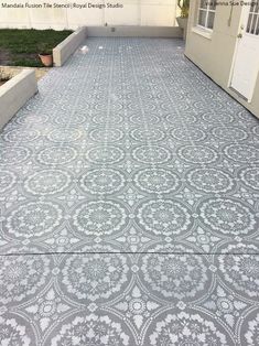 an outdoor patio that has been painted with cement