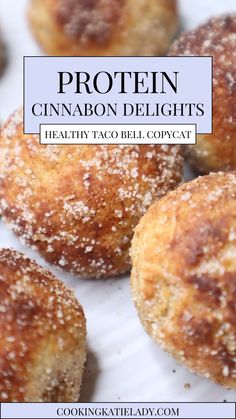 some sugar covered doughnuts sitting on top of a white paper plate with the title protein cinnamon delights healthy taco bell copycat