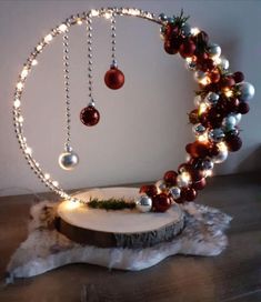 a christmas wreath made out of ornaments and lights