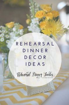 a table topped with vases filled with yellow and white flowers