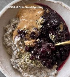 a bowl filled with oatmeal and fruit