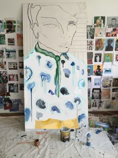 a painting is being worked on in an artist's studio