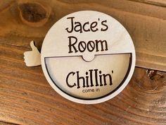 a wooden sign that says,'jace's room chillin come in '