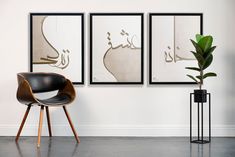 three framed pictures hang on the wall next to a chair and a potted plant