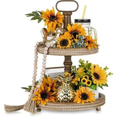 three tiered tray with sunflowers and other items