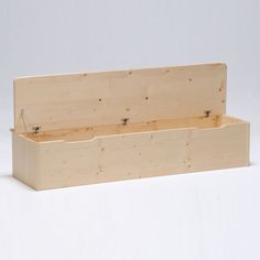 a wooden box with two compartments on it