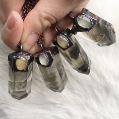 These necklaces are made from polished quartz which has heavy Chlorite inclusions/Phantoms. The green stone they are adorned with is Prehnite. From LEFT to RIGHT: A: Multiple Chlorite Phantoms throughout B: Multiple Chlorite Phantoms on lower half C: Two densely pigmented Chlorite Phantoms D: Multiple Chlorite Phantoms which are on an angle. The backside has a Key which is an indentation in the quartz where another crystal was forming. Choose which one. They are all about the same size and measu Ribbon Folding, Solder Jewelry, Copper Electroforming, Soldered Jewelry, Foxes Necklace, Soldering Jewelry, Wire Jewelry Designs, Wiccan Spells, Wire Wrapping Crystals