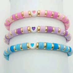 Cute Purple Bracelet, Handmade Bracelet Aesthetic, Little Bead Bracelet Ideas, Clay Bead Blue Bracelet Ideas, Beaded Bracelets Set, Pastel Bracelet Ideas, Pink And Purple Bracelet, Purple Bracelet Aesthetic, Ideas For Beaded Bracelets