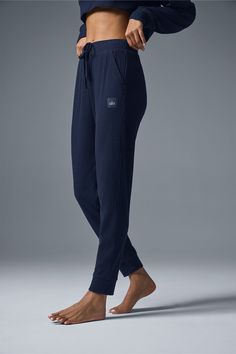 Meet the sweats you’ve seen all over your feed. They’re done in a plush, incredibly soft, wide-ribbed fabric that feels as good as it looks. The jogger-style silhouette is luxuriously cozy with a high-rise waistband and ankle cuffs. Make it a matching set with the Muse Hoodie. Alo Yoga Sporty Loungewear Bottoms, Athleisure Sweatpants With Ribbed Cuffs For Loungewear, Cozy Pants With Ribbed Cuffs, Alo Yoga Activewear With Ribbed Waistband For Loungewear, Sporty Ribbed Lounging Bottoms, Cozy Joggers With Ribbed Cuffs For Leisure, Athleisure Ribbed Lounging Bottoms, Ribbed Athleisure Bottoms For Lounging, Sporty Ribbed Activewear For Loungewear