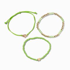 Stack these bracelets on your wrist for inspiration! The three-pack set includes a gold-tone beaded stretch bracelet, a lime green beaded stretch bracelet with a gold-tone heart, and a lime green adjustable bracelet with a gold-tone flower. Pack Size: 3Closure: Stretch fit, BoloMaterial: Plastic, Polyester, Metal - Claire's Lime Green ''Grow'' Inspiration Beaded Bracelet Set - 3 Pack Crown Hair Clip, Sensitive Ears Earrings, Piercing Kit, Flower Crown Hairstyle, Seed Bead Bracelet, Hair Accessories Gift, Fashionable Jewelry, Demi Fine Jewelry, Holiday Jewelry