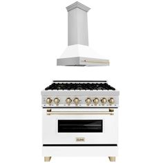 a white stove top oven sitting next to a wall mounted hood over it's two burners