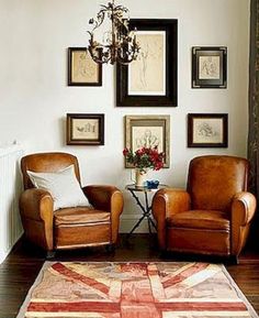 two chairs and a rug in a room