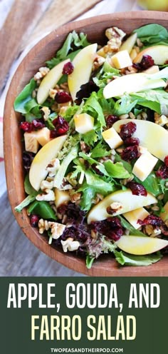 an apple, goudaa and faro salad in a wooden bowl