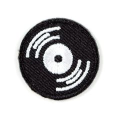 a black and white patch with an eye on it