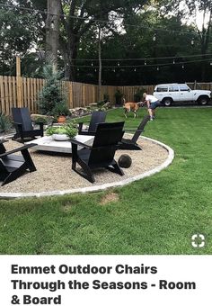 an outdoor lounge area with chairs and tables in the middle of it, surrounded by grass