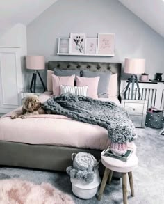 Grey bed, pink fluffy rug, grey knitted throw, grey fluffy rug, mirrored silver bedside table, pink bedside lamp, white round table with wooden legs Dark Grey And Pink Bedroom, Bedroom Ideas Pink And Grey, Pink Grey And White Bedroom, Pink Fluffy Rug, Grey And Pink Bedroom Ideas, Grey Bed Frame Bedroom Ideas, Pink Grey Bedroom, Pink And Gray Bedroom, Bedroom Ideas Chic